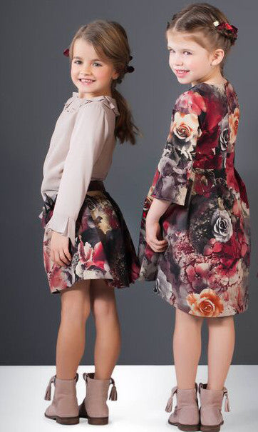 Patachou floral dress on model at backside.