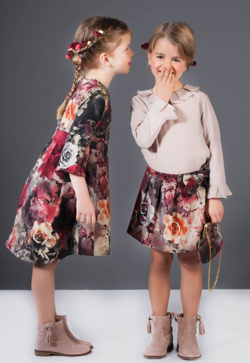 Patachou floral dress on model side view.