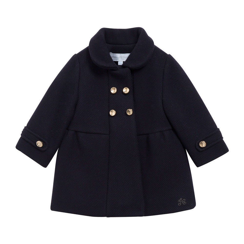 Tartine navy coat pictured on front.