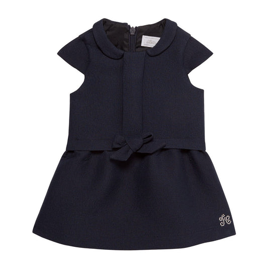 Tartine et Chocolat navy dress with bow on front.